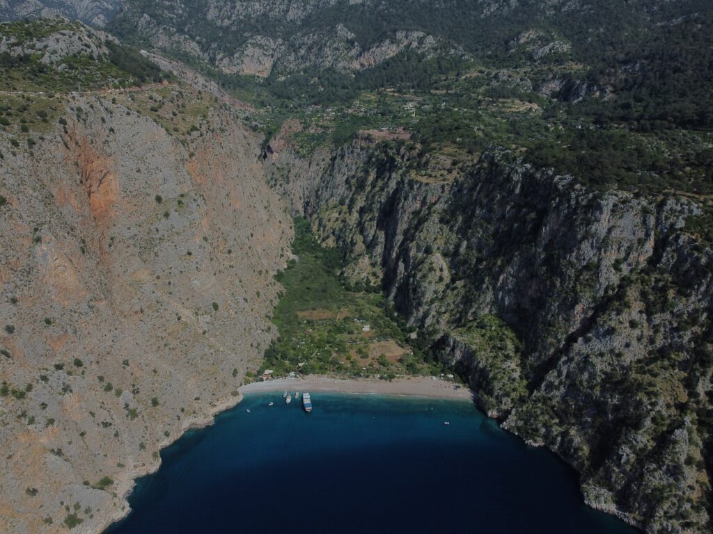 Photo by Alexey Komissarov: https://www.pexels.com/photo/aerial-view-of-the-butterfly-valley-fethiye-turkey-12116614/