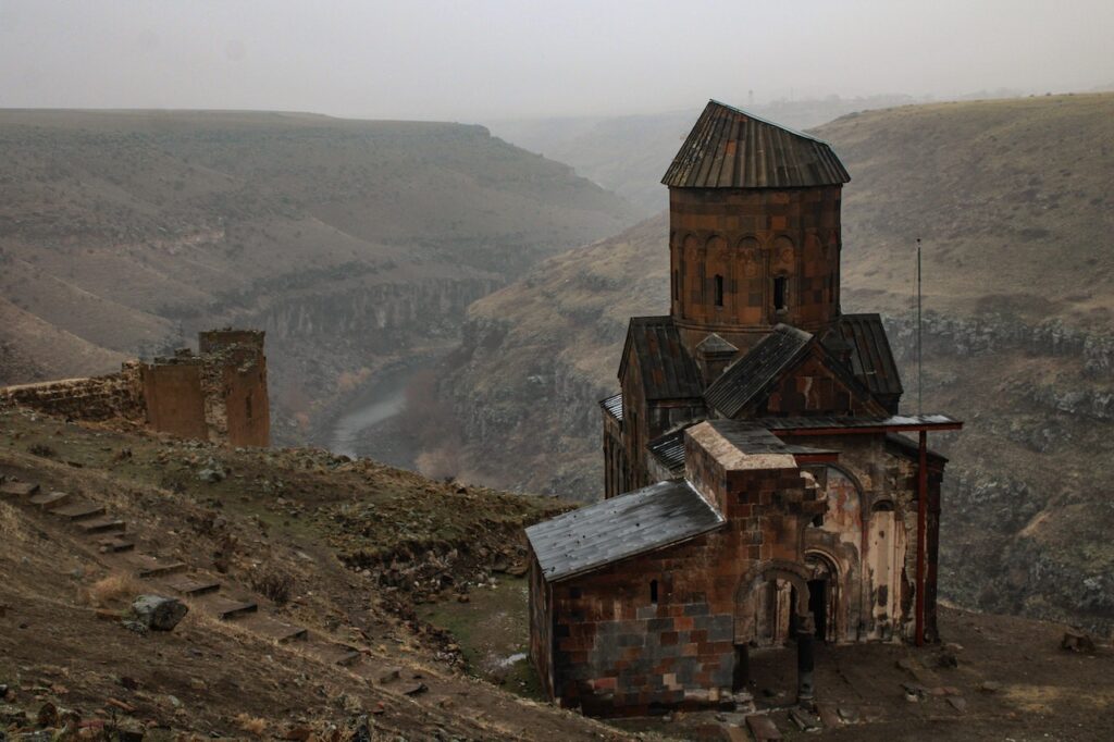 Photo by hayat40tansonra: https://www.pexels.com/photo/tigran-honents-on-mountain-top-10784138/