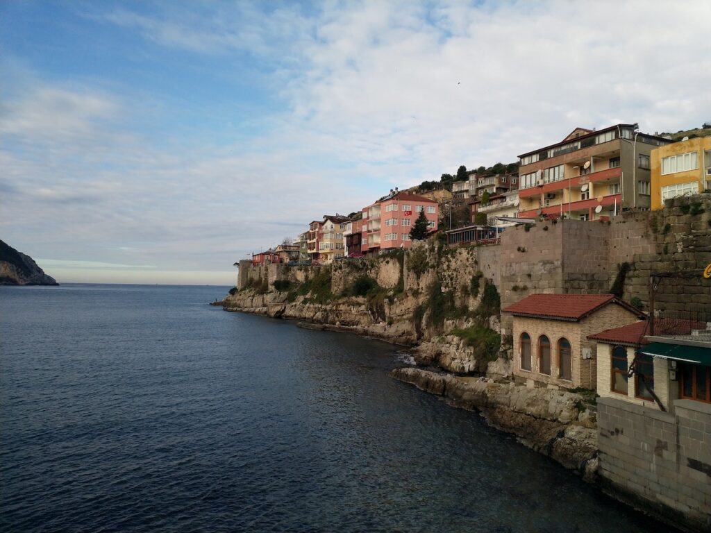 Photo by Mehmet Dığış: https://www.pexels.com/photo/buildings-near-body-of-water-8101871/